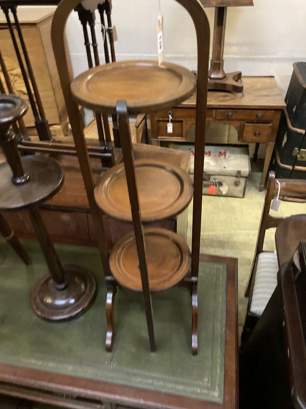 An Edwardian folding cake stand, a beech bar stool and a smokers stand